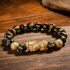 Black Mantra Pixiu Bracelet Wood Background