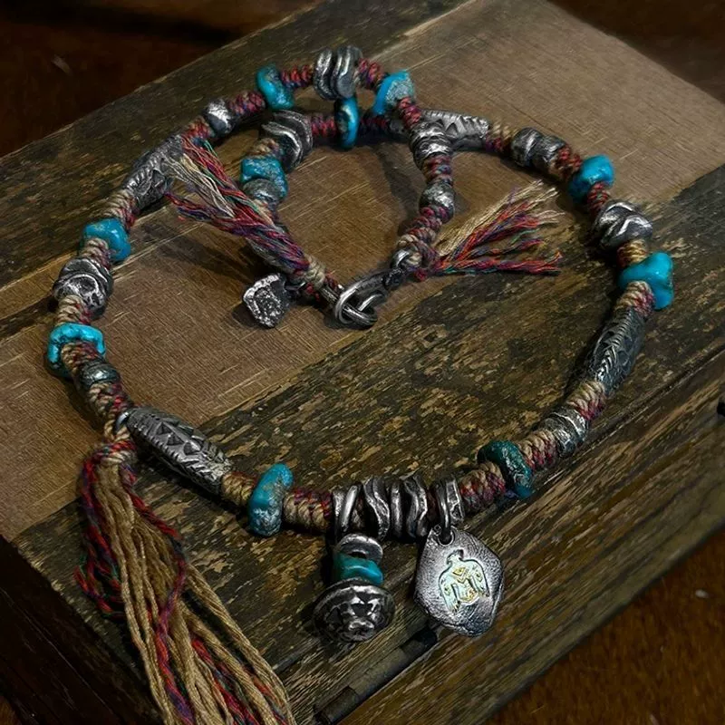 Handmade Boho Necklace Tassel Detail – Turquoise Beads & Silver Accents Handmade boho necklace tassel detail – turquoise beads & silver accents