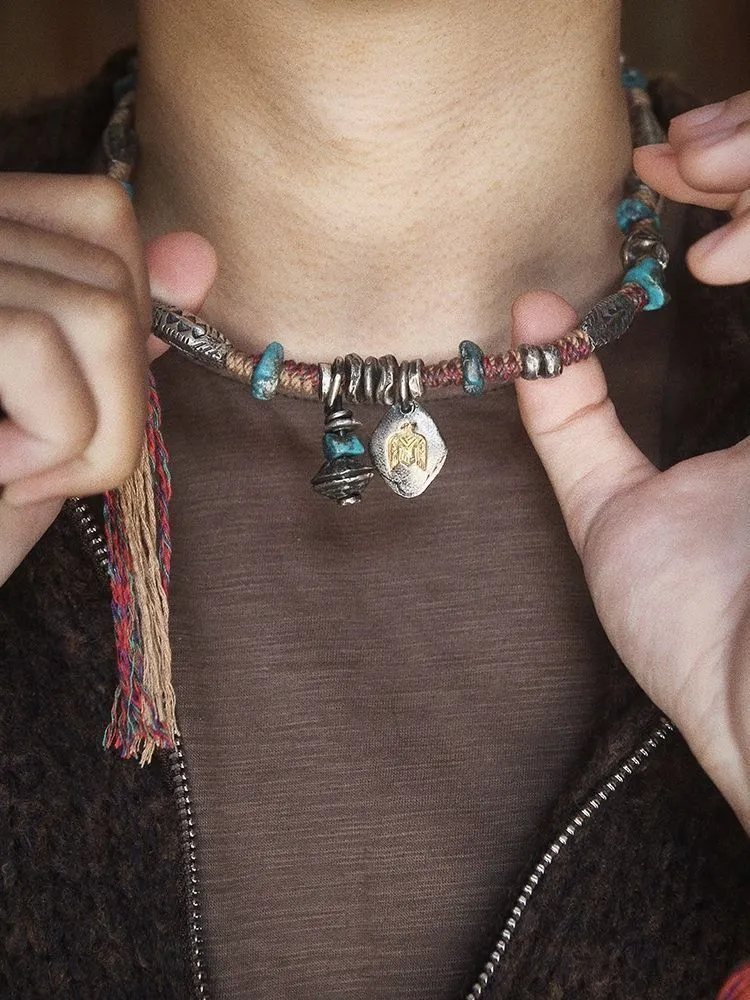 Rustic Tribal Necklace Close-Up – Artisan Silver Beads and Natural Turquoise Rustic tribal necklace close up – artisan silver beads and natural turquoise
