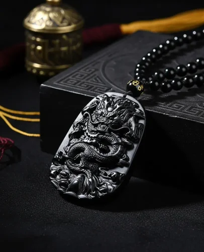 Tibetan black obsidian dragon necklace cultural display
