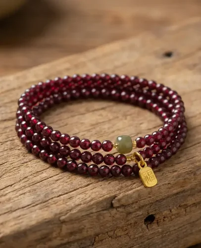 Handmade garnet bracelet artisan wooden display