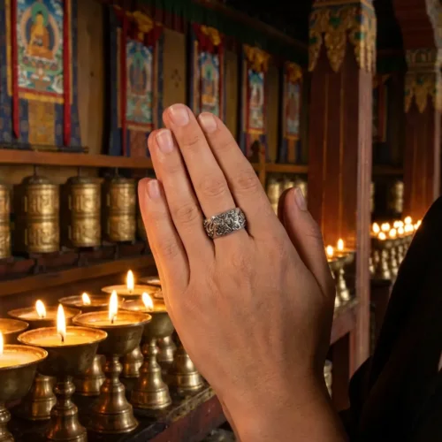 Wearing mahakala ring while praying in tibetan buddhist temple