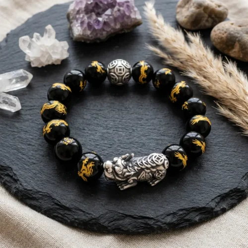 Pixiu obsidian bracelet natural crystal flatlay