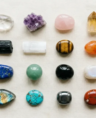 Crystal meanings chart showing 16 beginner crystals with their colors, chakras, and traditional meanings