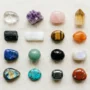 Crystal meanings chart showing 16 beginner crystals with their colors, chakras, and traditional meanings