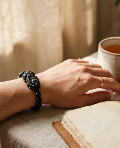 does-pixiu-bracelet-work-black-obsidian Black obsidian Pixiu bracelet worn on a left wrist as a daily intention and wealth symbol