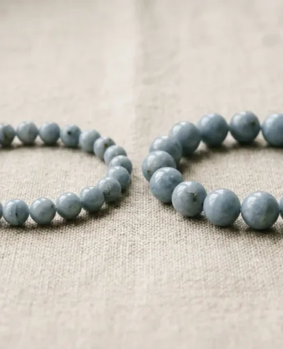 8mm and 10mm crystal bead bracelets shown side by side to compare bead size and how each sits on the wrist