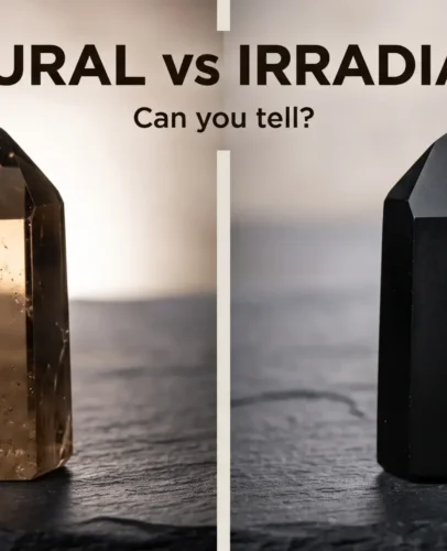 natural-vs-irradiated-smoky-quartz-hero Natural smoky quartz point glowing brown beside an opaque jet-black irradiated smoky quartz point